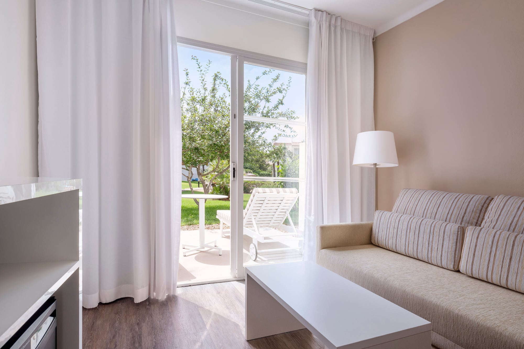 a living room with a couch and a table