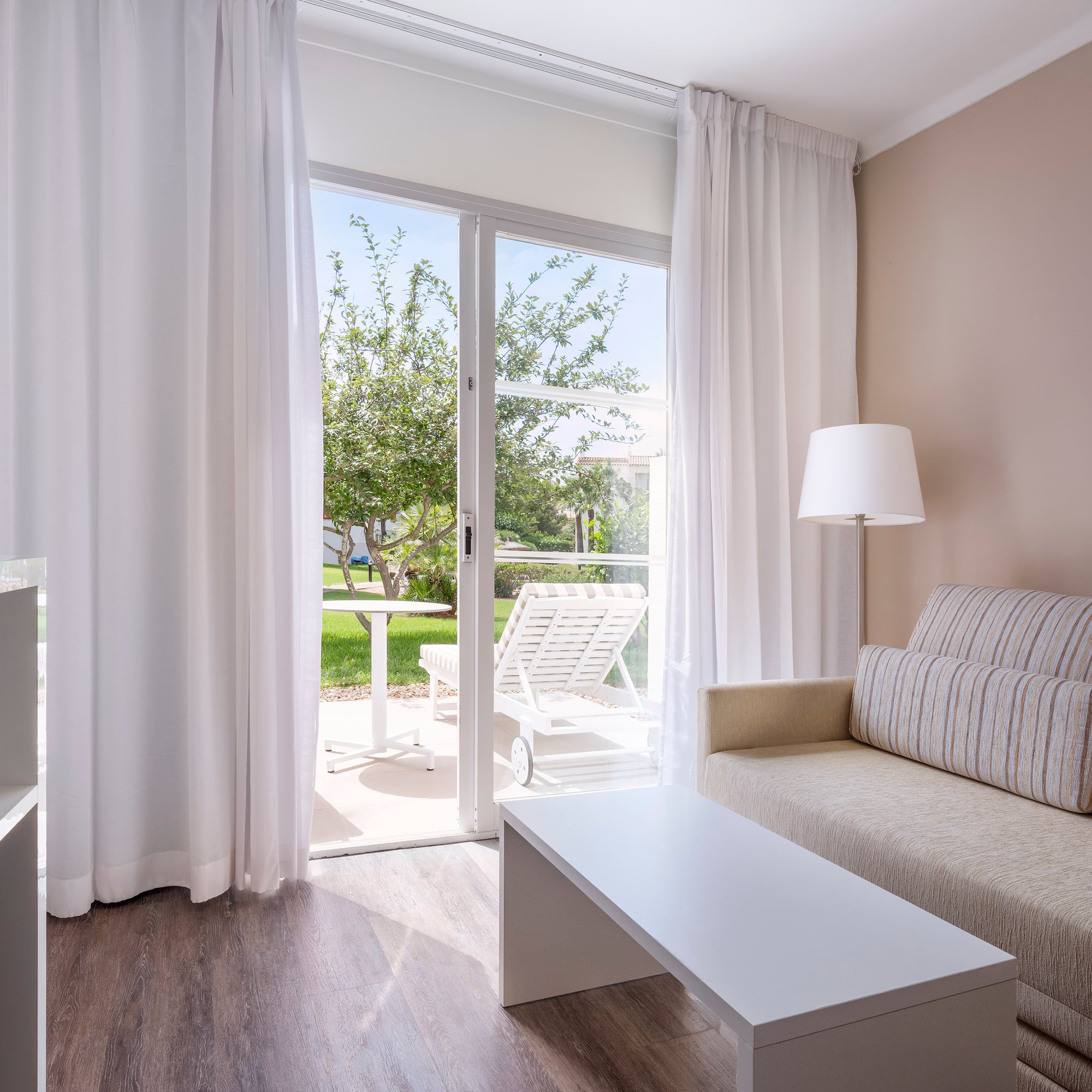 a living room with a couch and a table