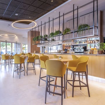 a restaurant with tables and chairs