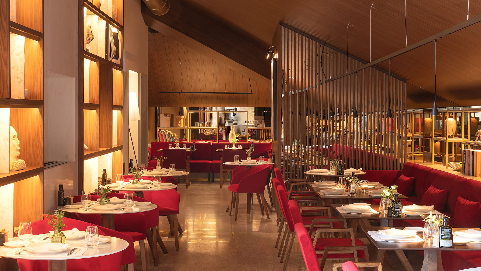 a restaurant with tables and chairs