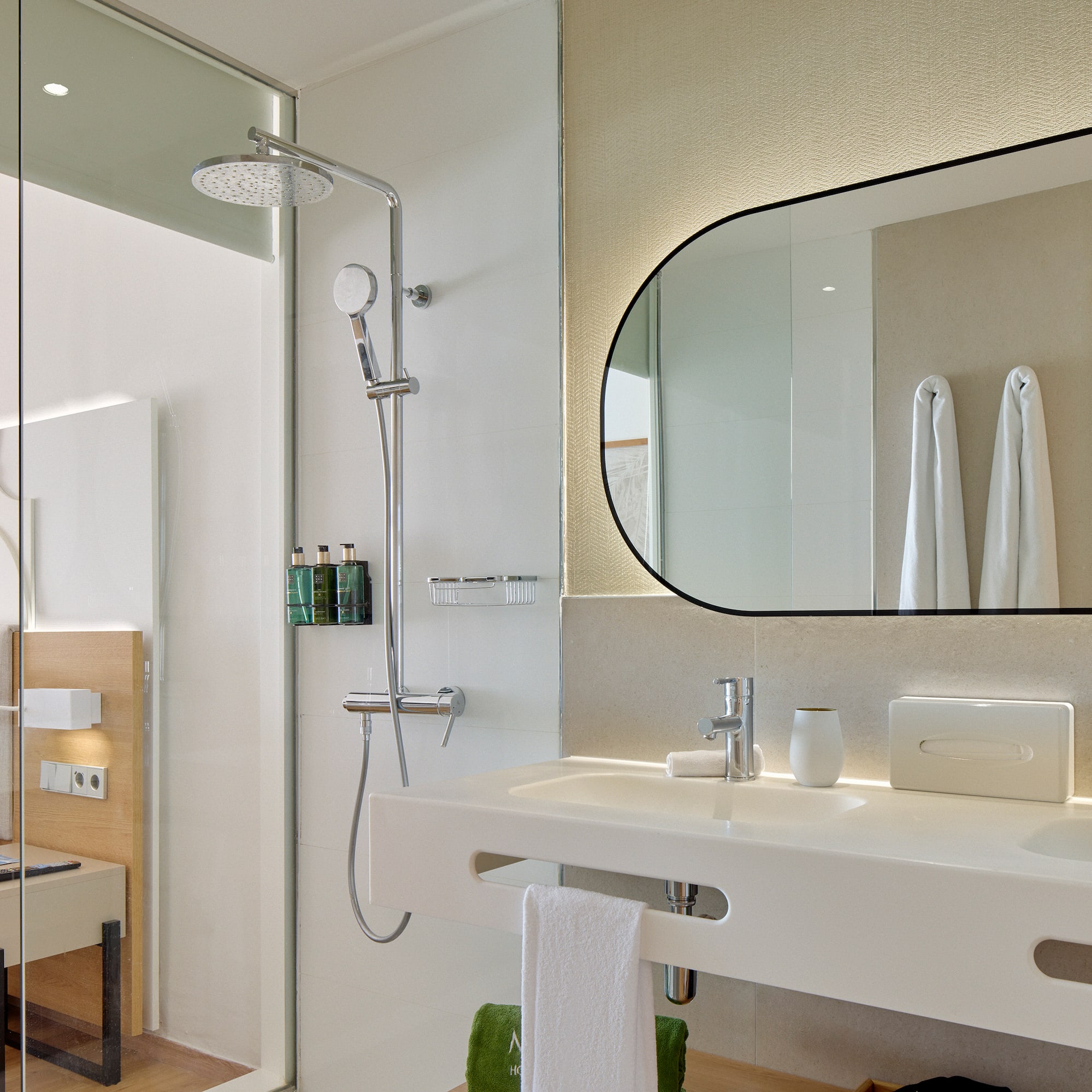 a bathroom with a shower and sink