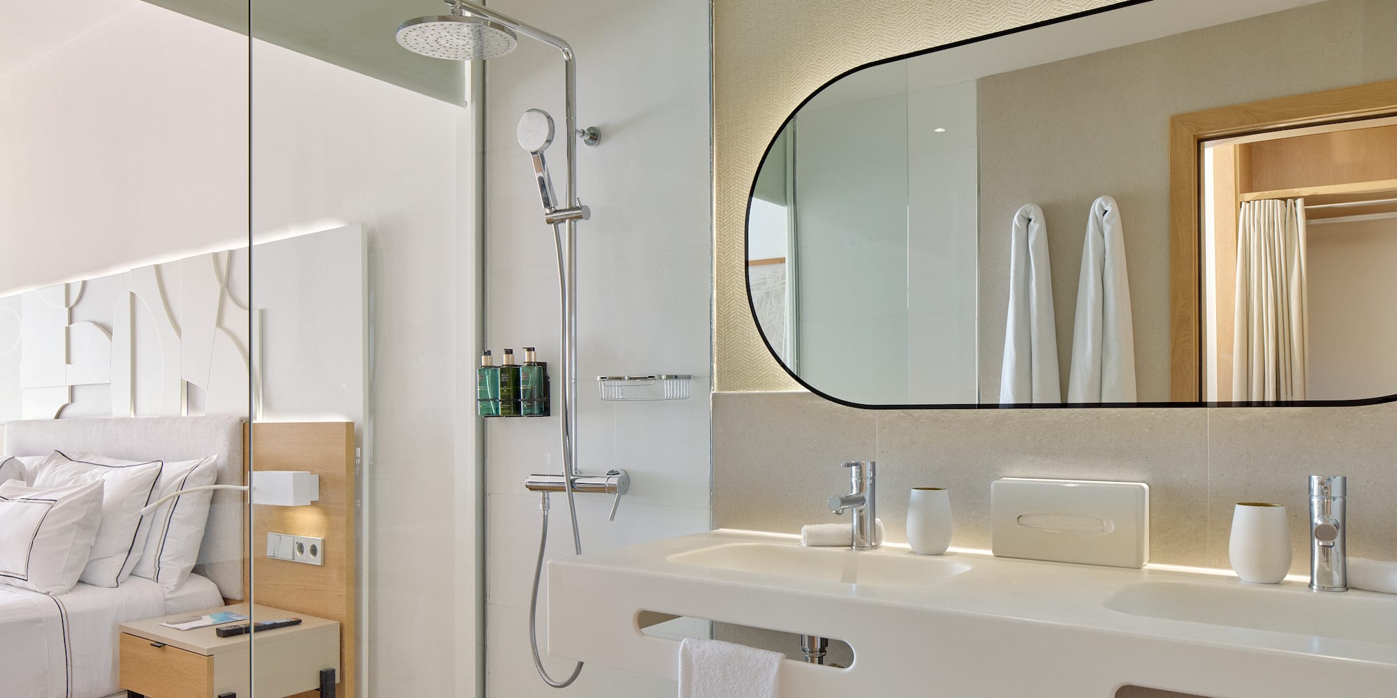 a bathroom with a shower and sink