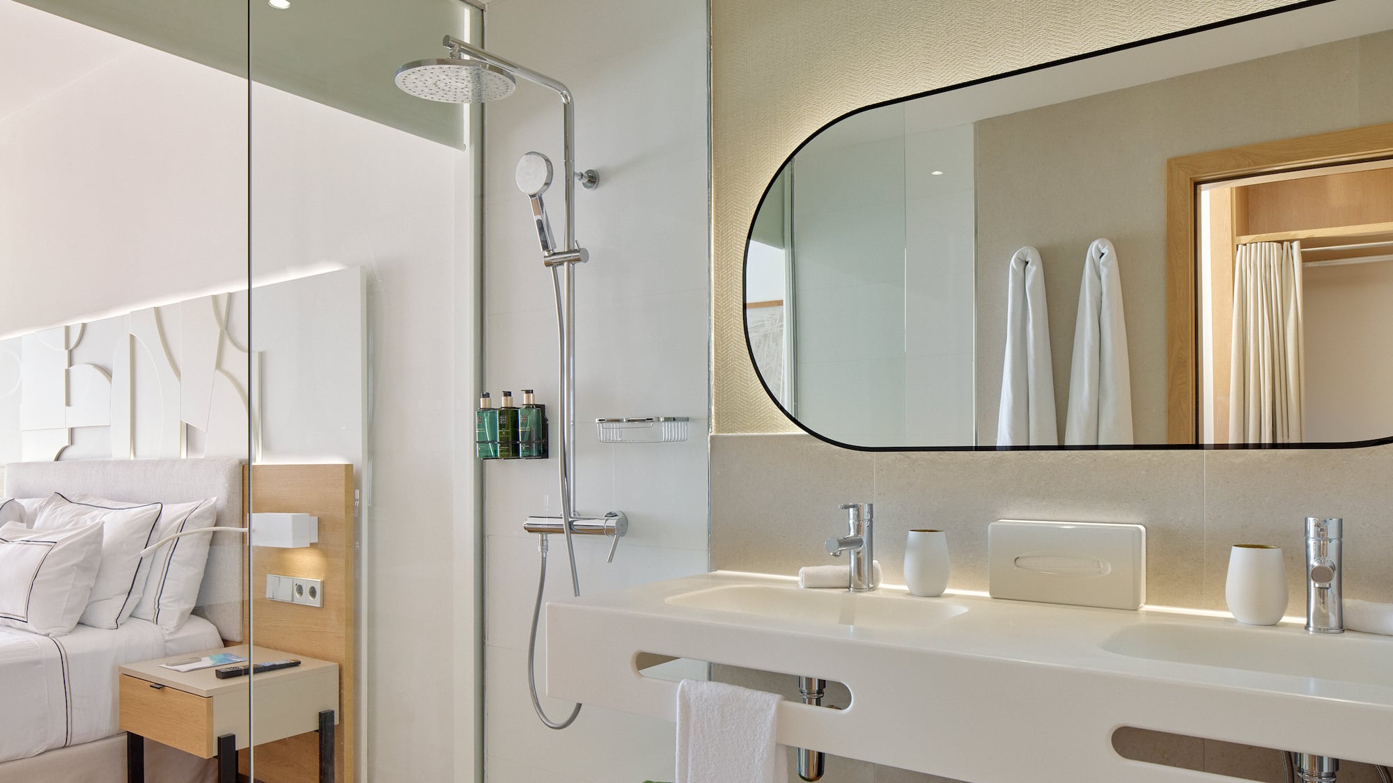 a bathroom with a shower and sink