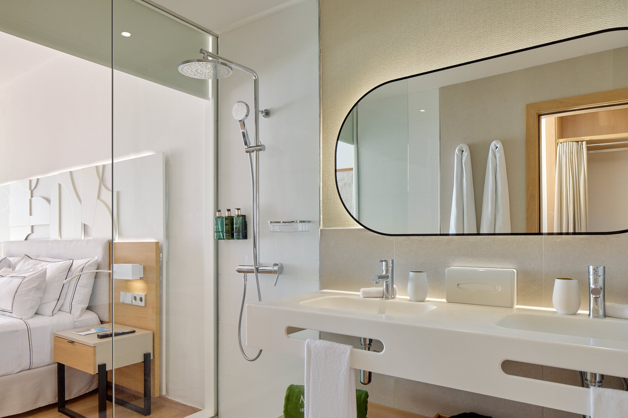 a bathroom with a shower and sink