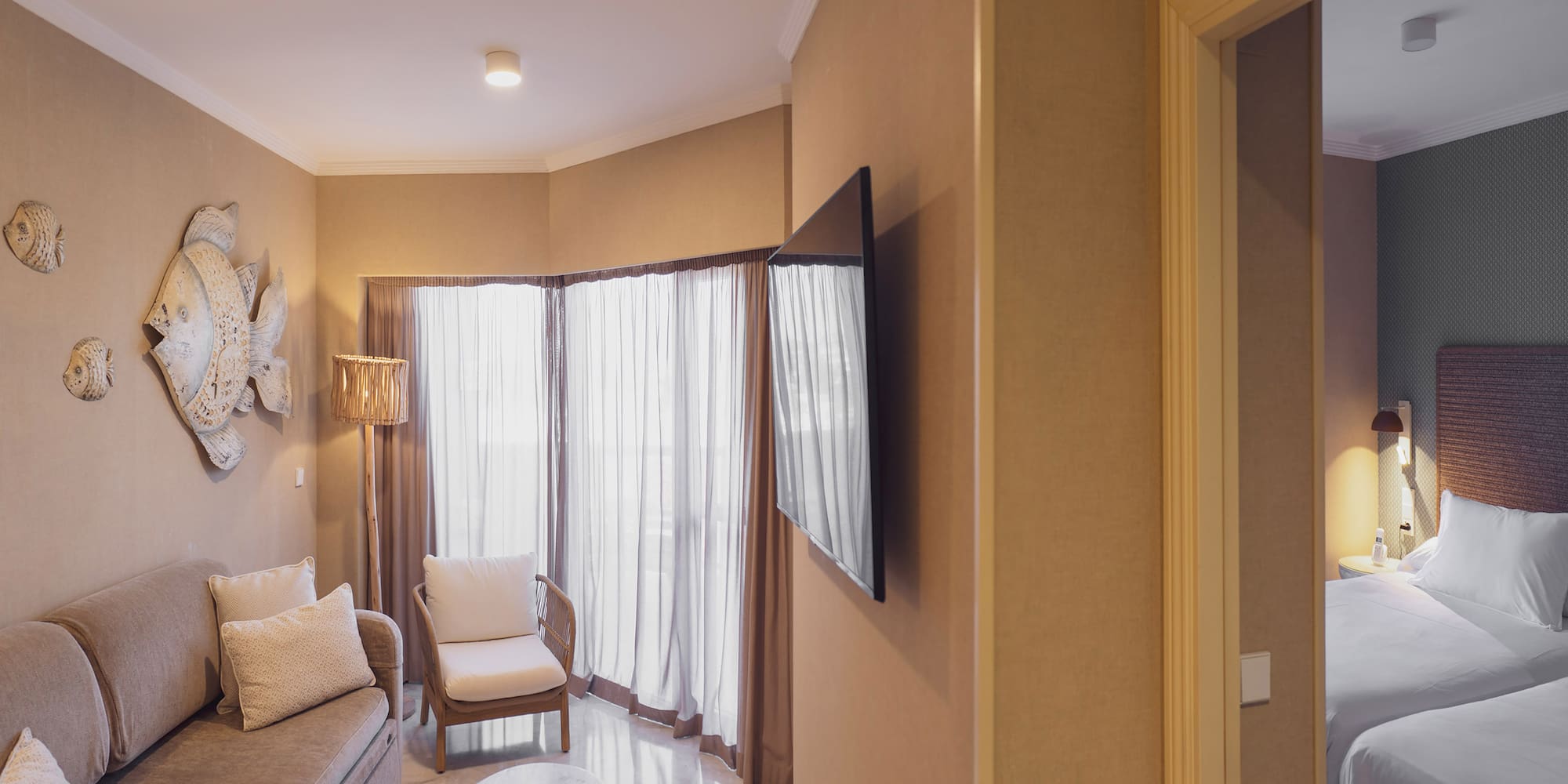 a living room with a tv and a couch