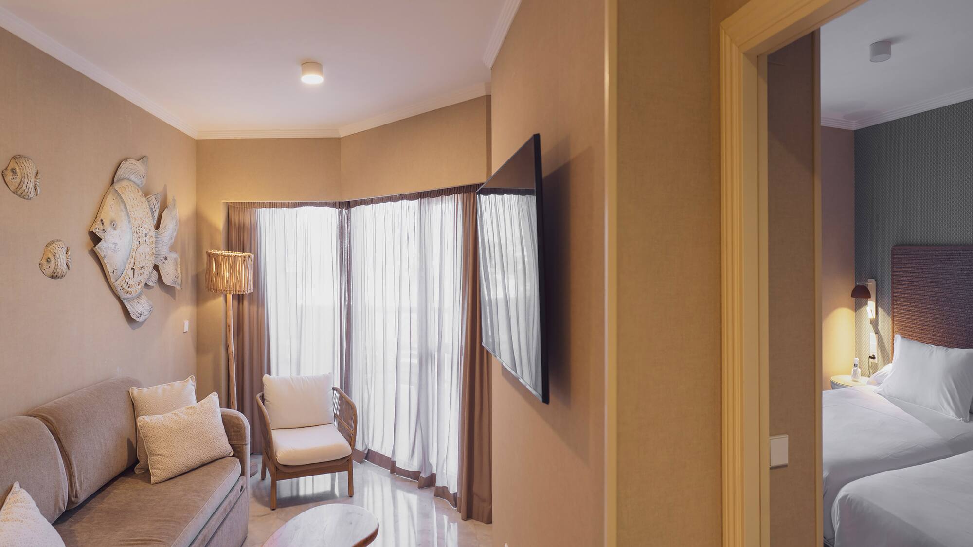 a living room with a tv and a couch