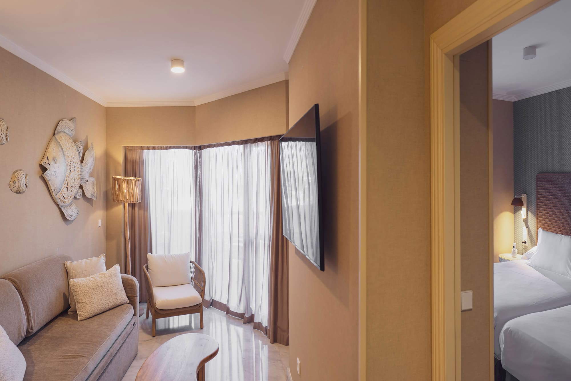 a living room with a tv and a couch