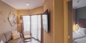 a living room with a tv and a couch