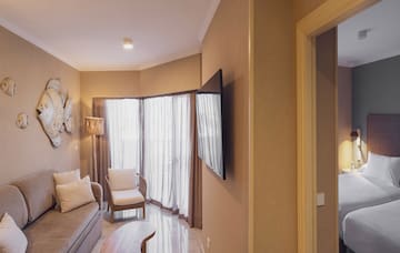 a living room with a tv and a couch