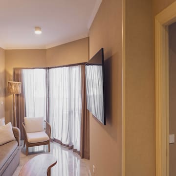 a living room with a tv and a couch