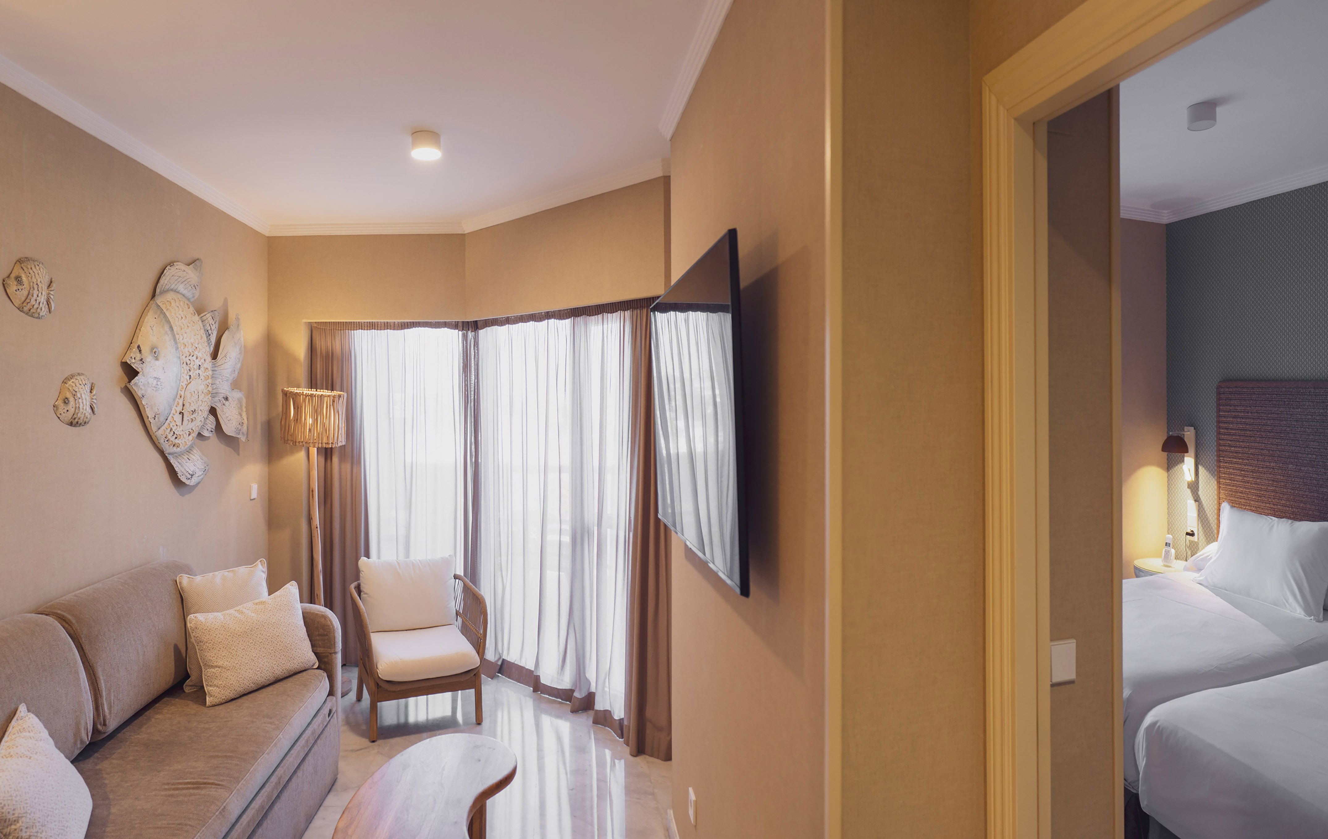 a living room with a tv and a couch