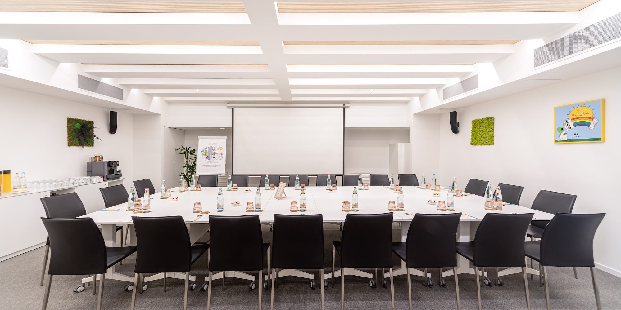 a room with a table and chairs