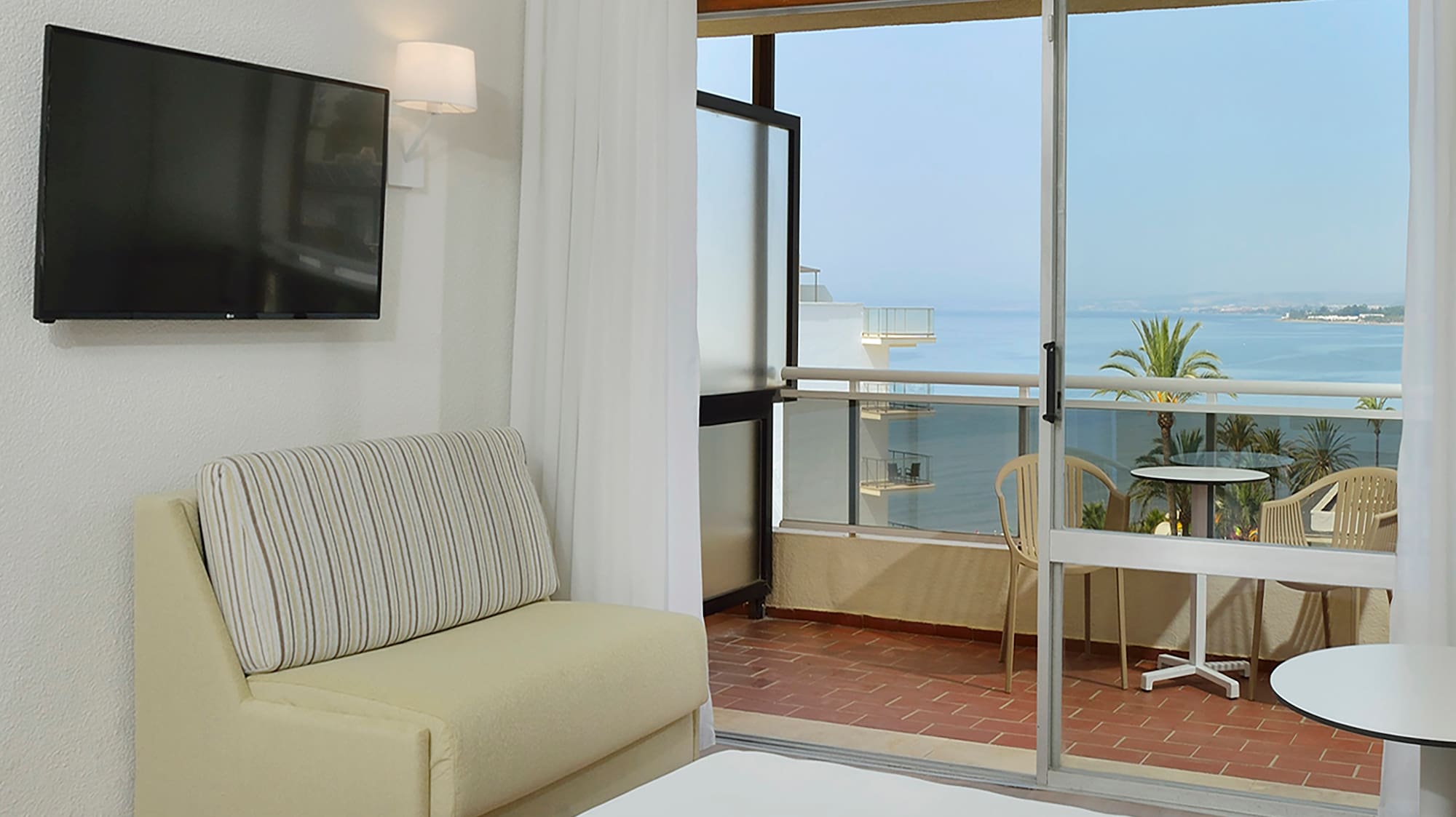 a room with a television and a couch