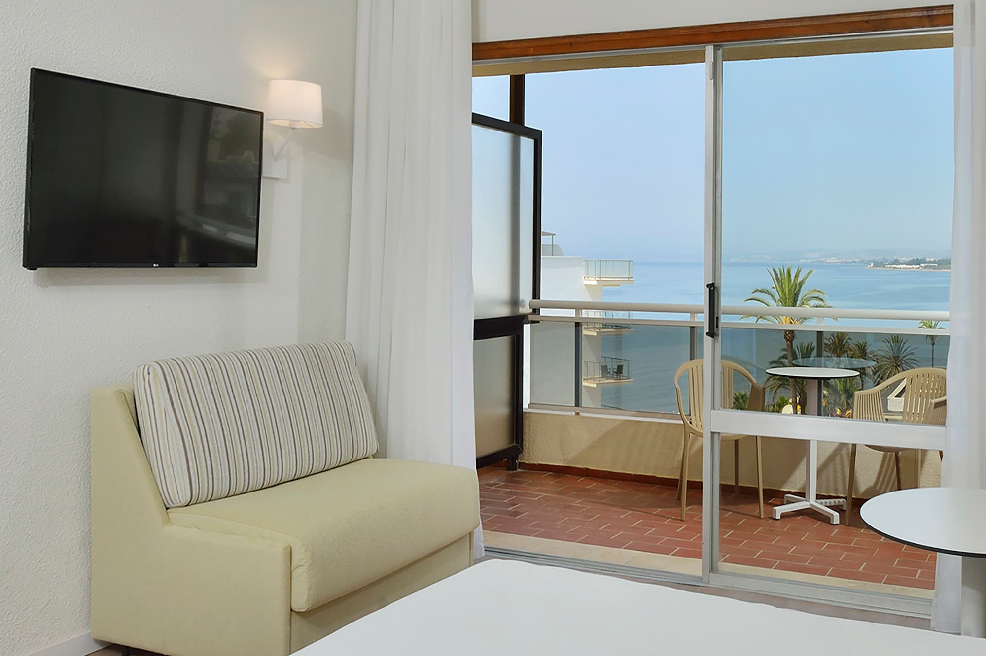 a room with a television and a couch