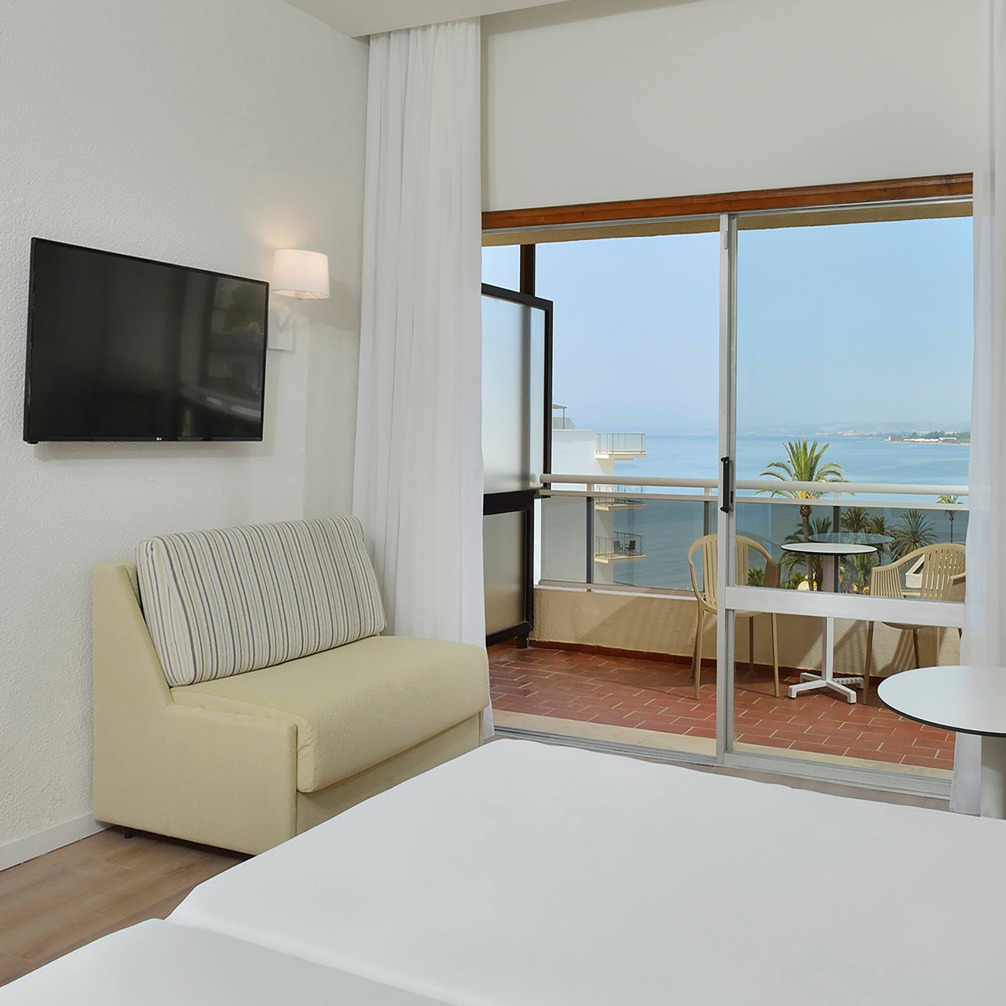 a room with a television and a couch