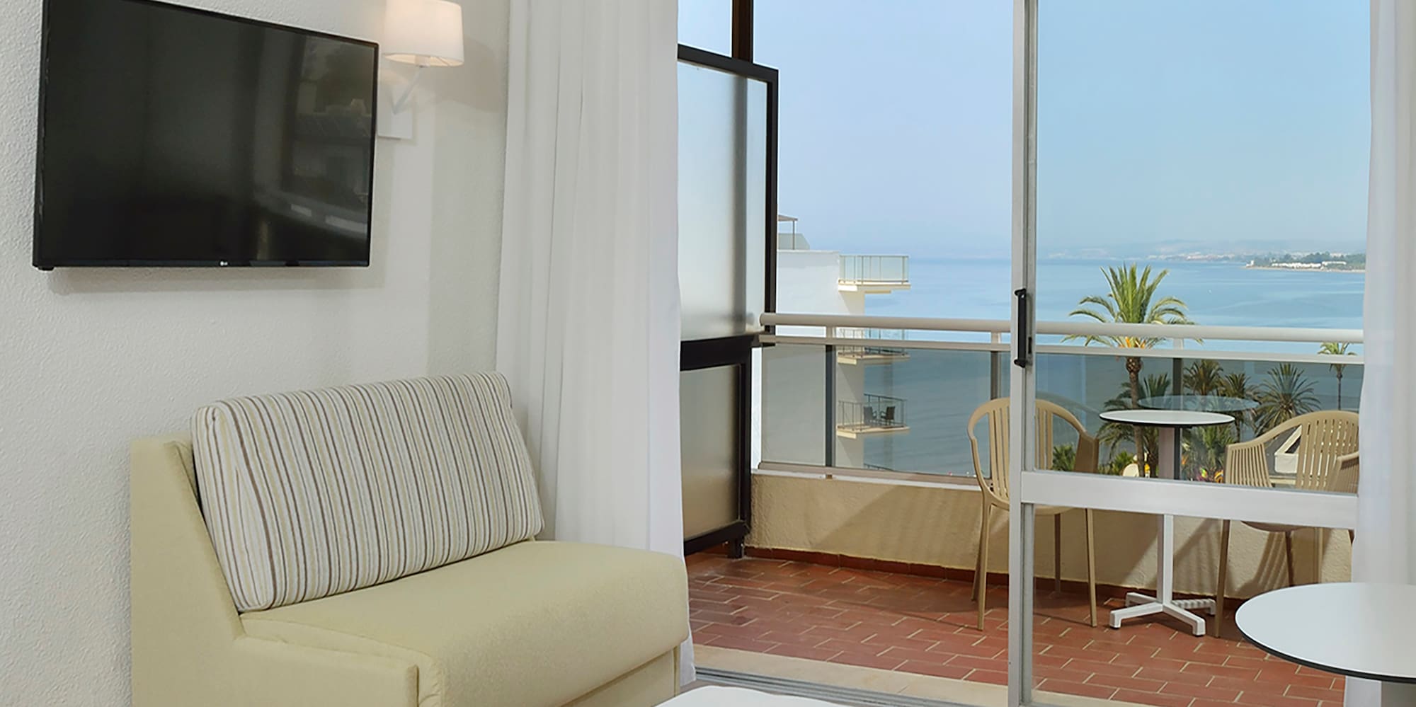 a room with a television and a couch