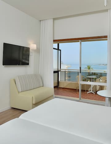 a room with a television and a couch