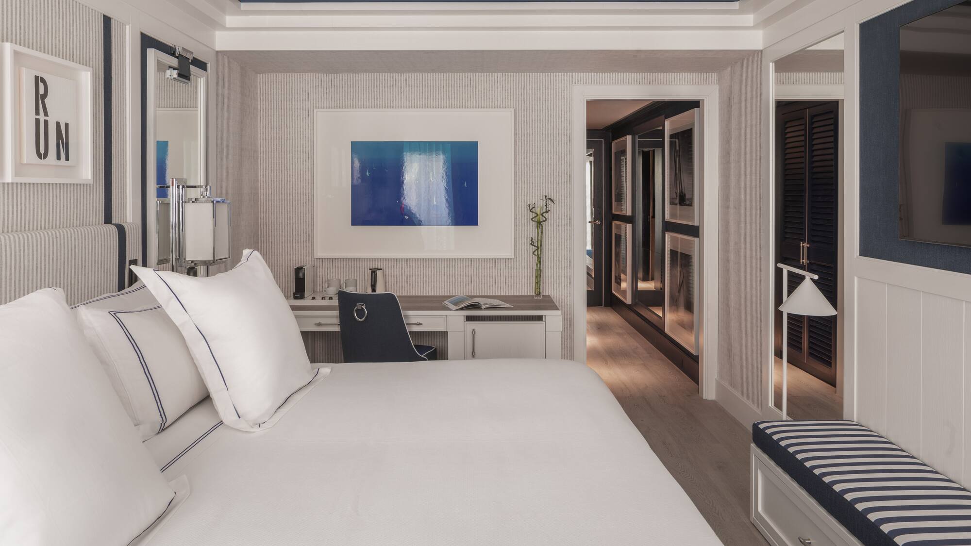 a room with a bed and a desk