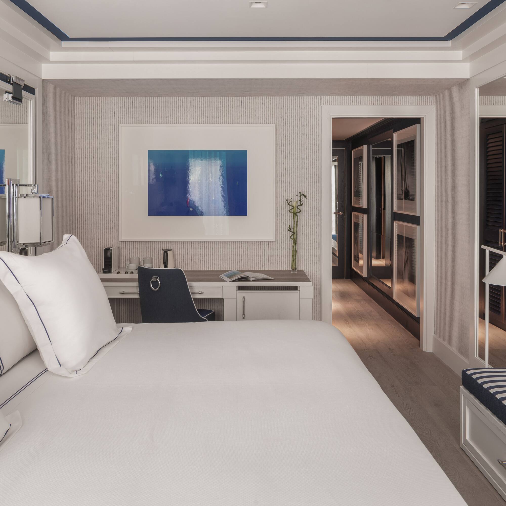 a room with a bed and a desk