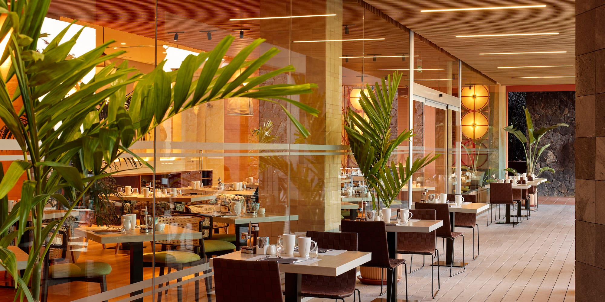 a restaurant with tables and chairs