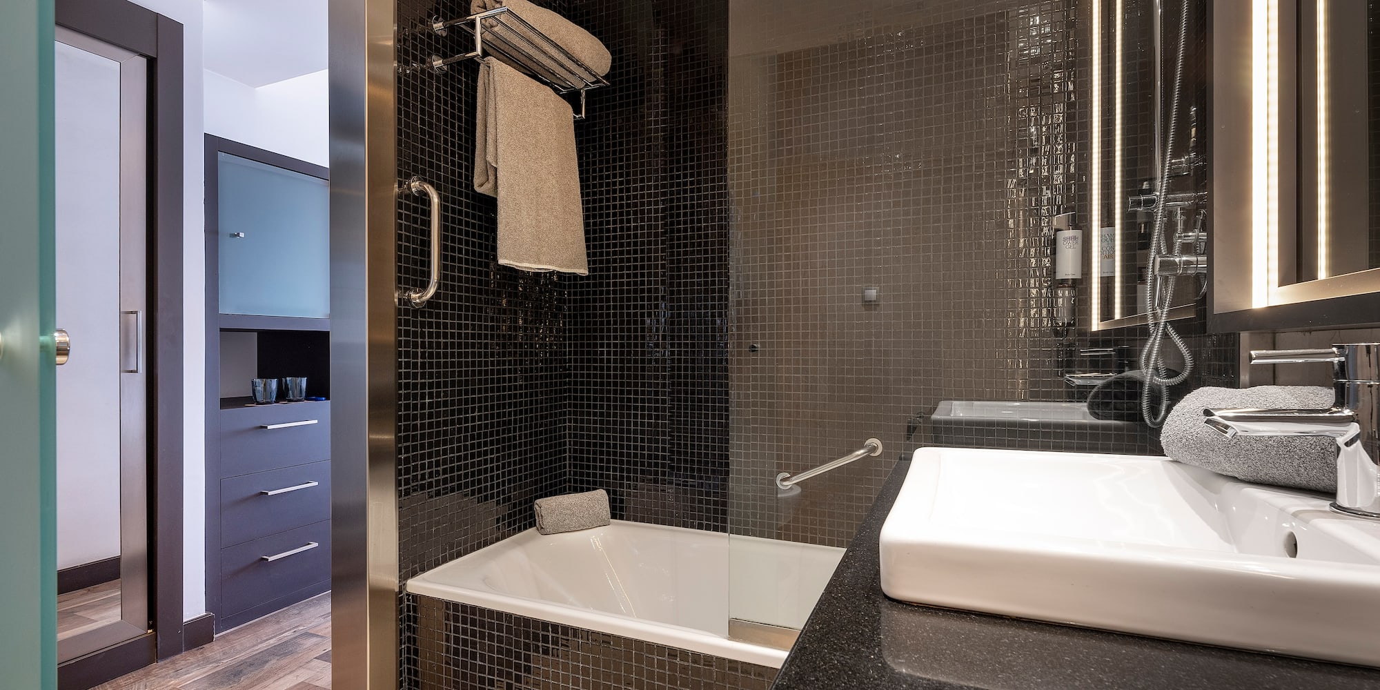 a bathroom with a sink and a bathtub