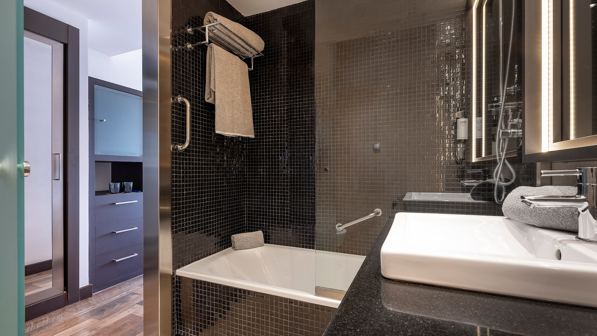 a bathroom with a sink and a bathtub