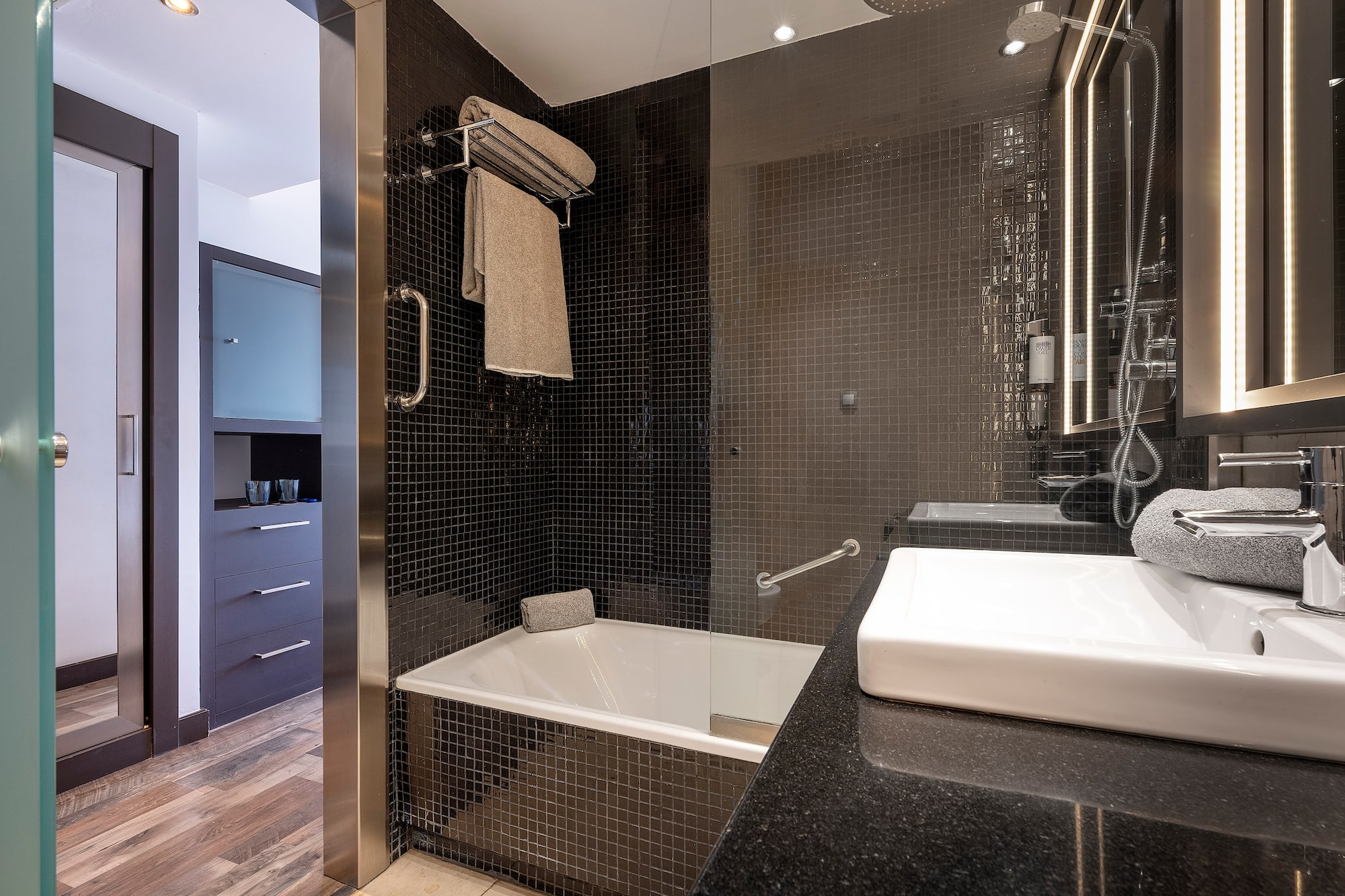 a bathroom with a sink and a bathtub
