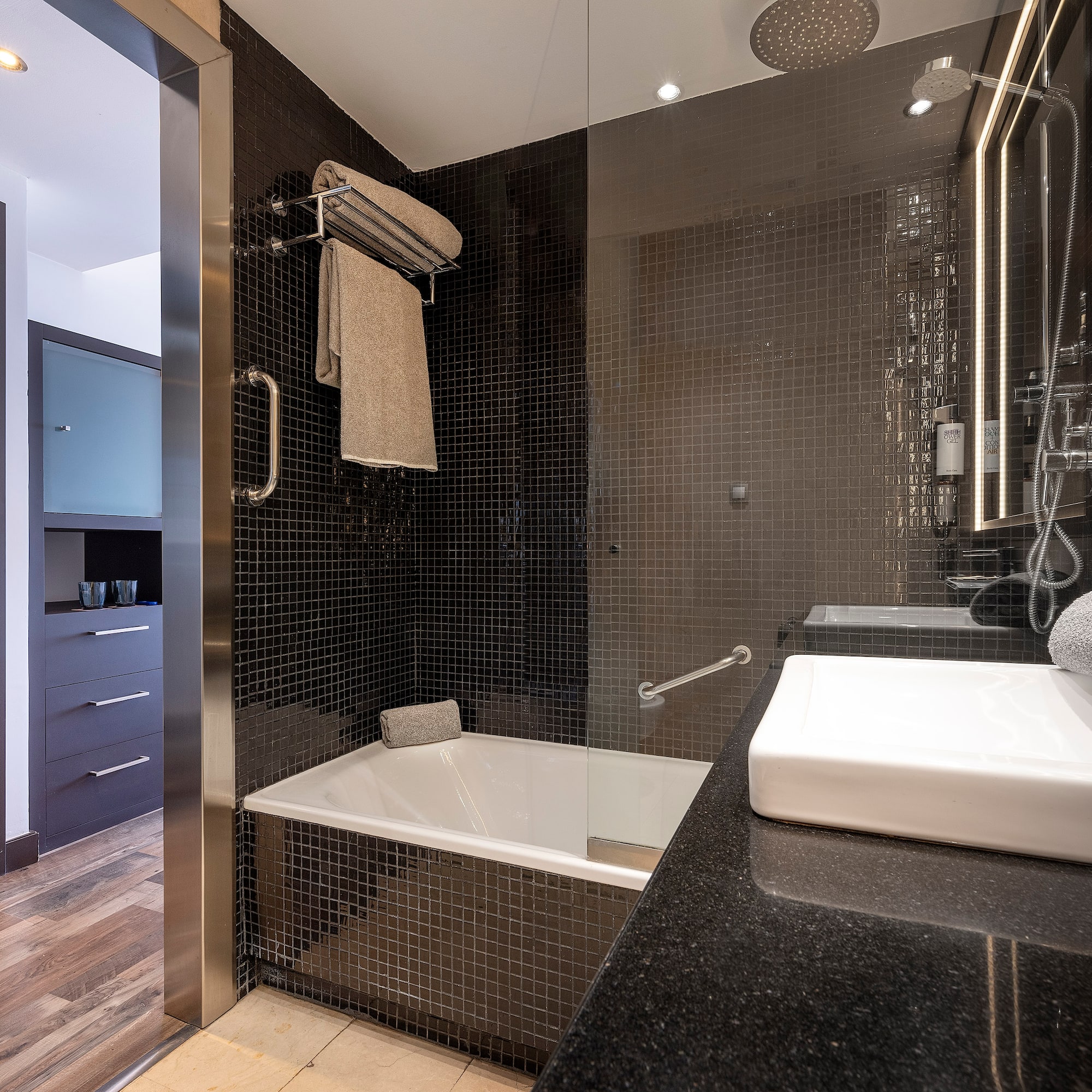 a bathroom with a sink and a bathtub