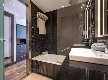a bathroom with a sink and a bathtub