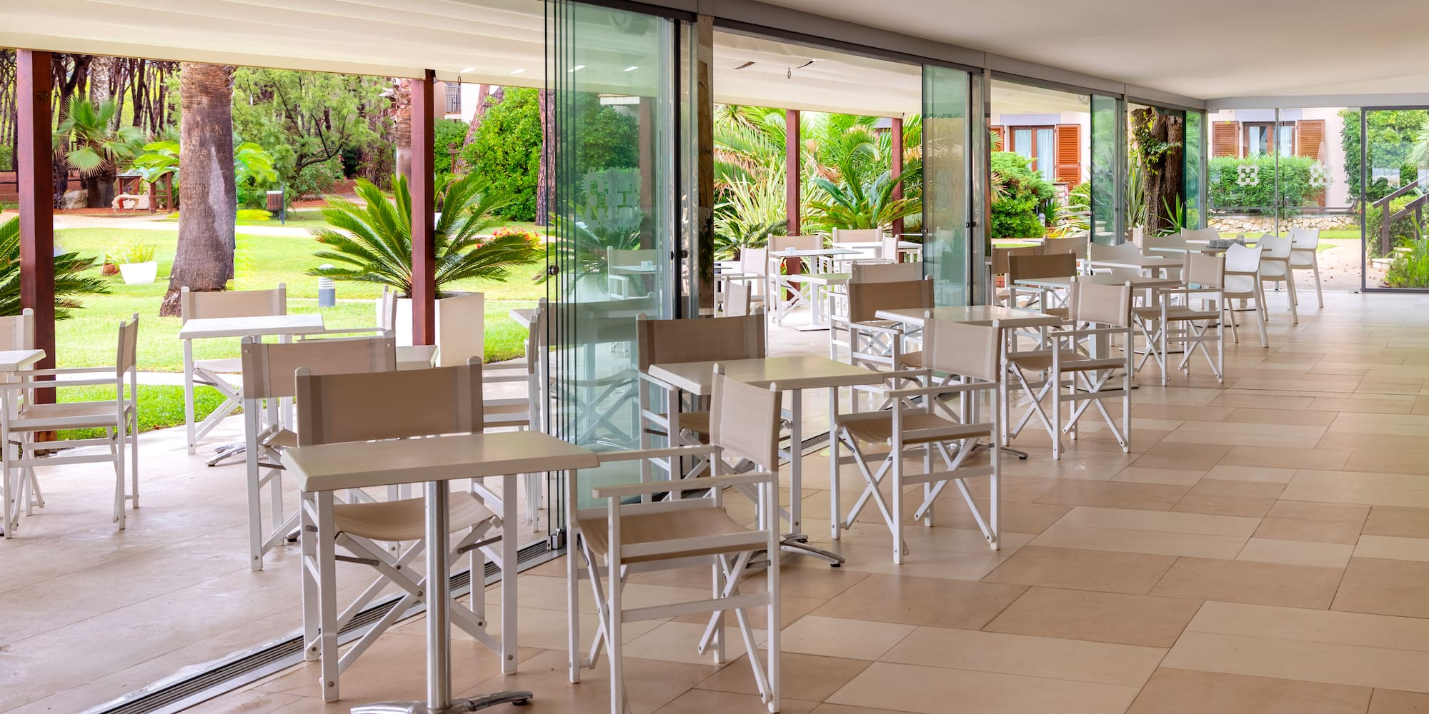 a room with tables and chairs