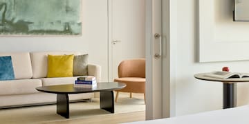 a room with a couch and coffee table