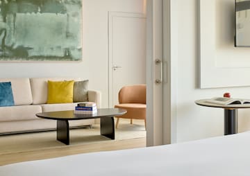 a room with a couch and coffee table