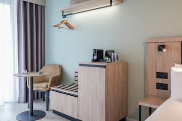 a room with a table and chairs