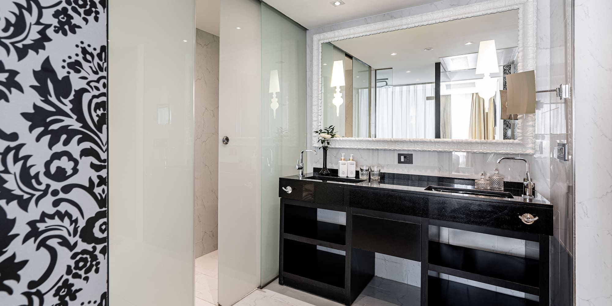 a bathroom with a mirror and sink