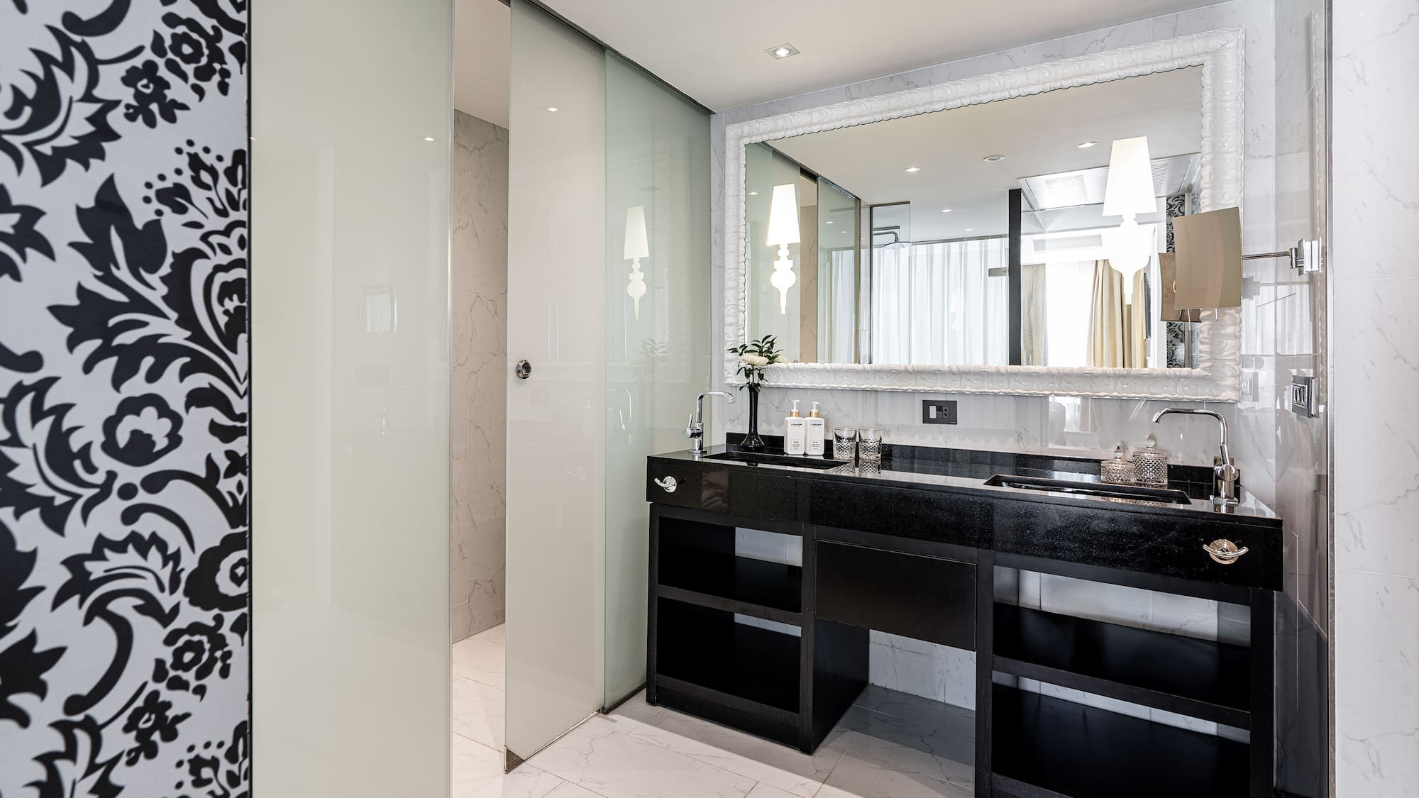 a bathroom with a mirror and sink