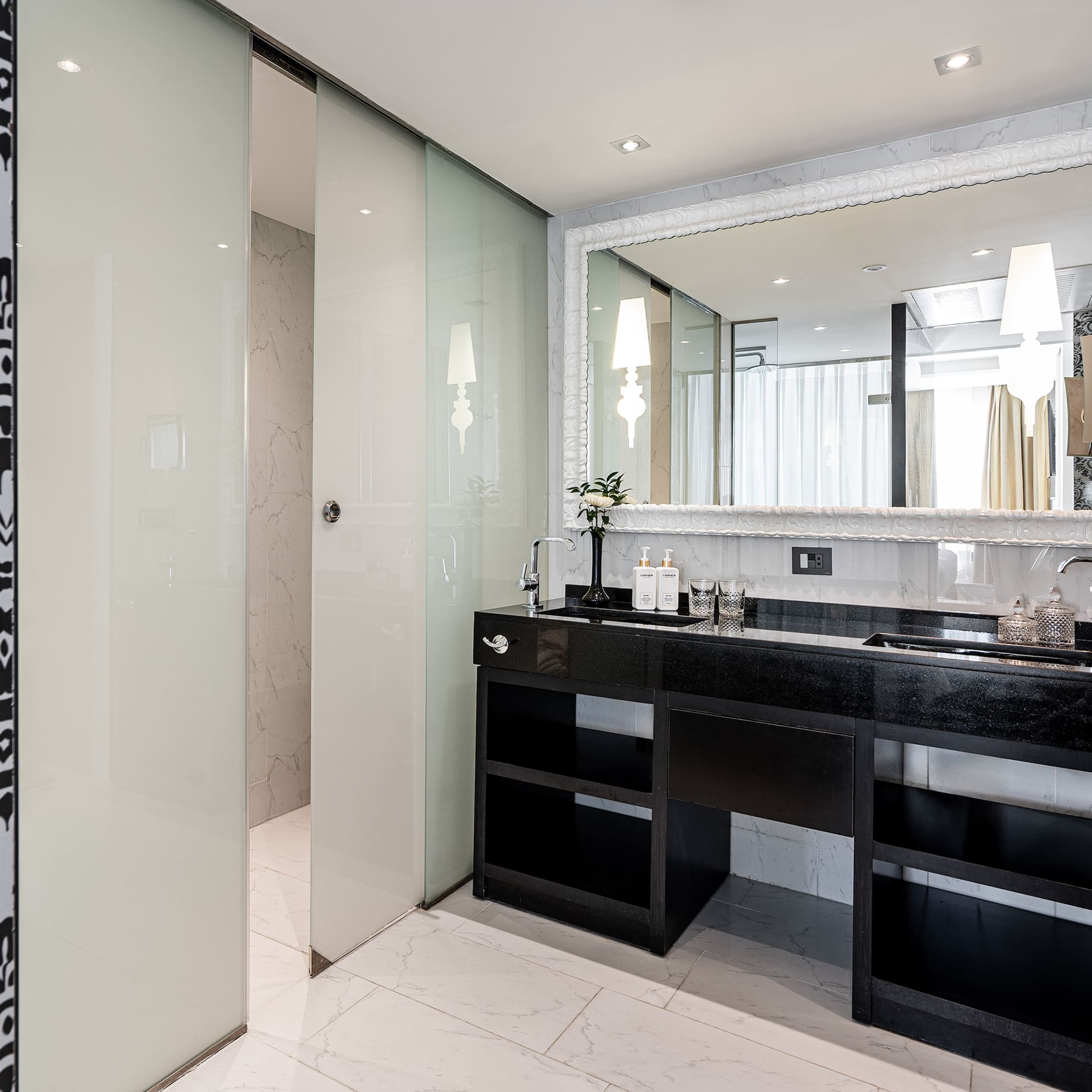 a bathroom with a mirror and sink