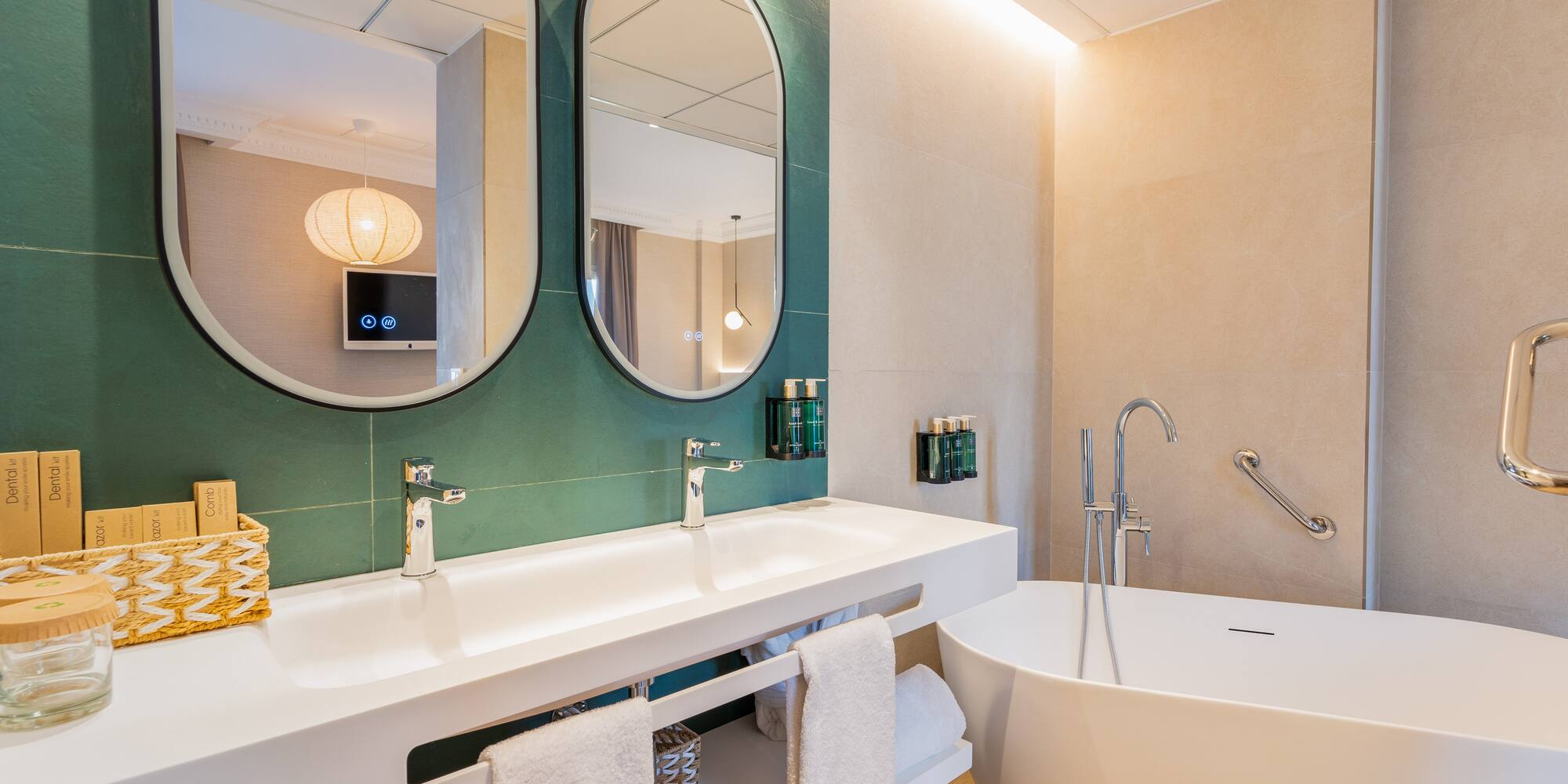 a bathroom with a tub and sink