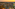 Rooftop bar with sunset city view, outdoor lounge, and ambient lighting.