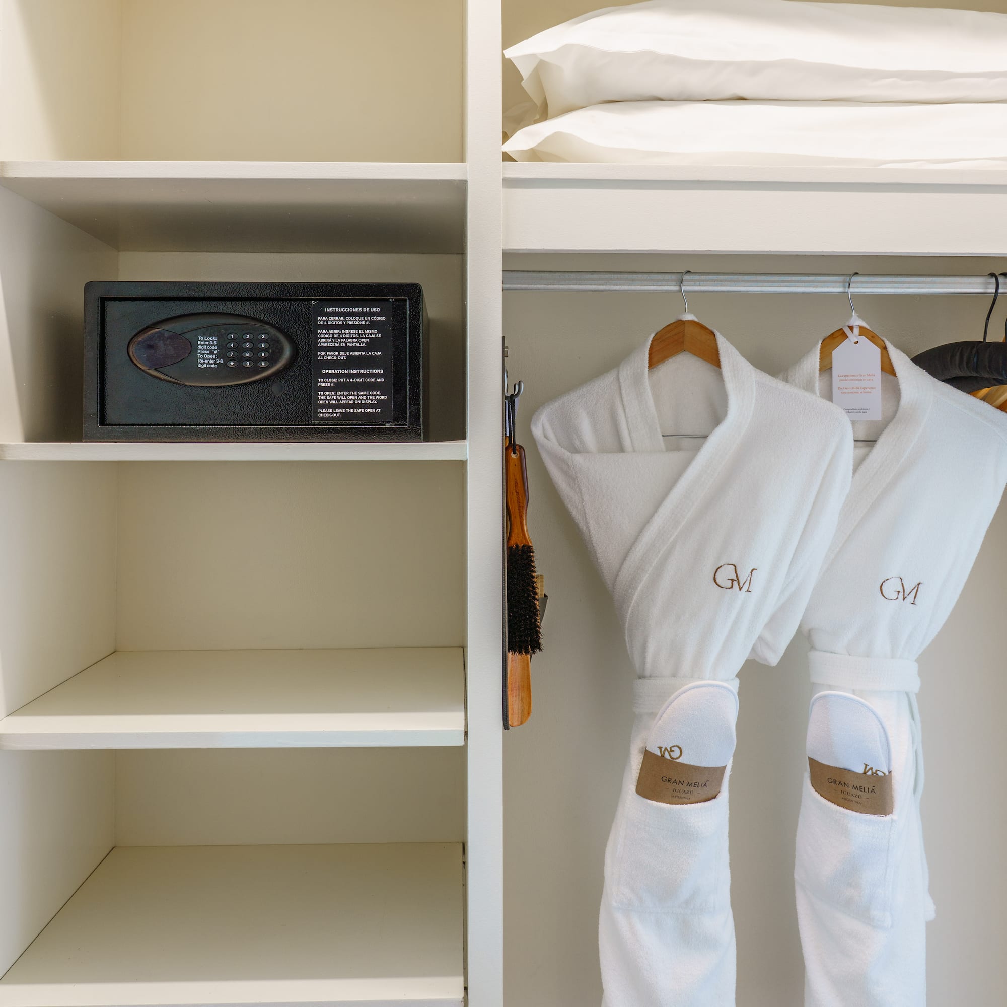 a white robe on swingers and a safe