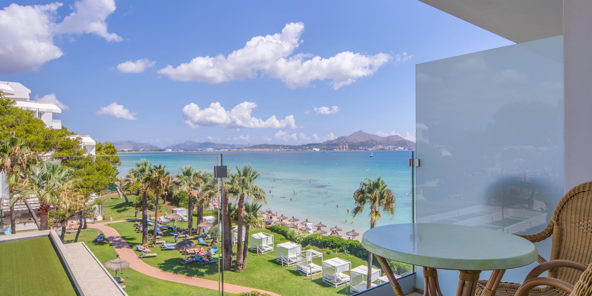 a view of a beach from a balcony
