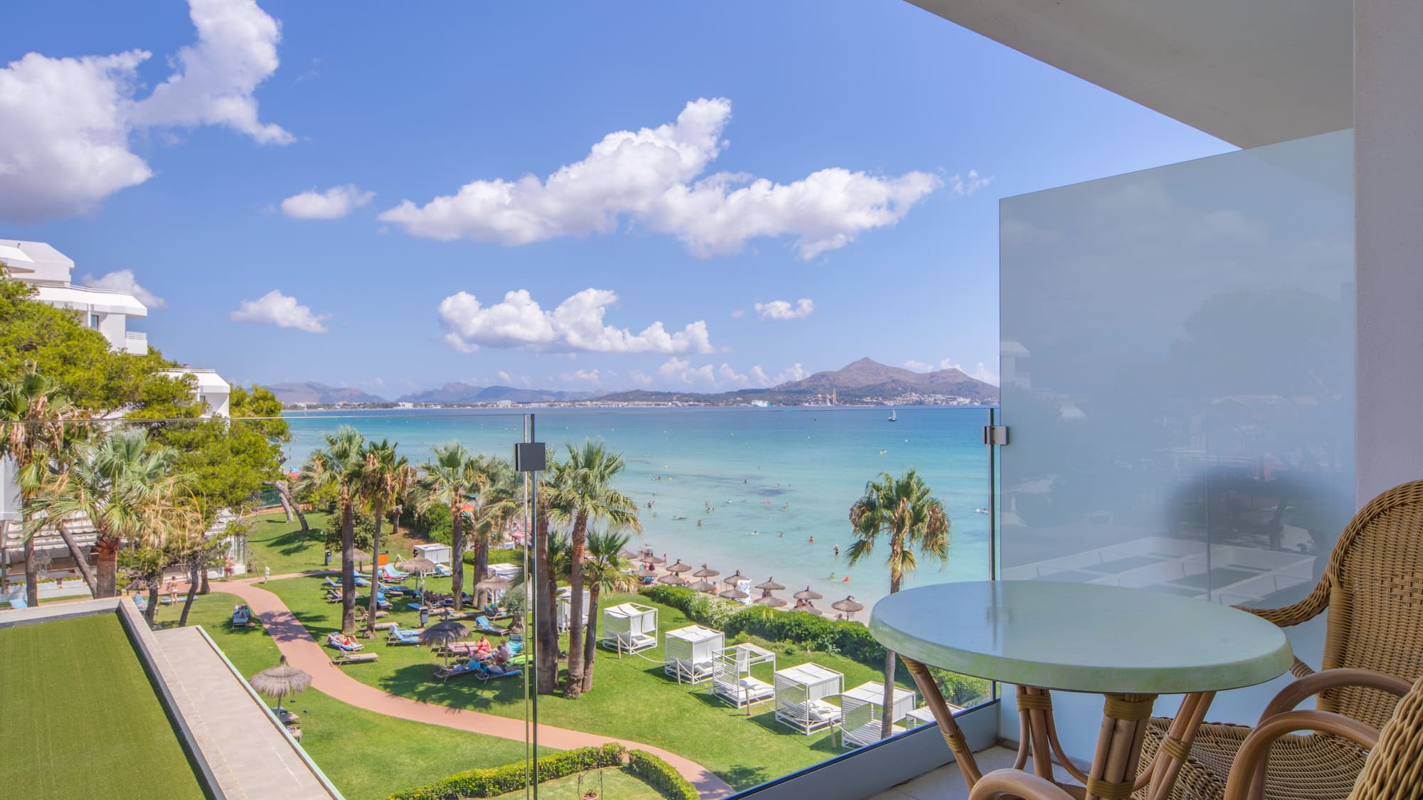 a view of a beach from a balcony