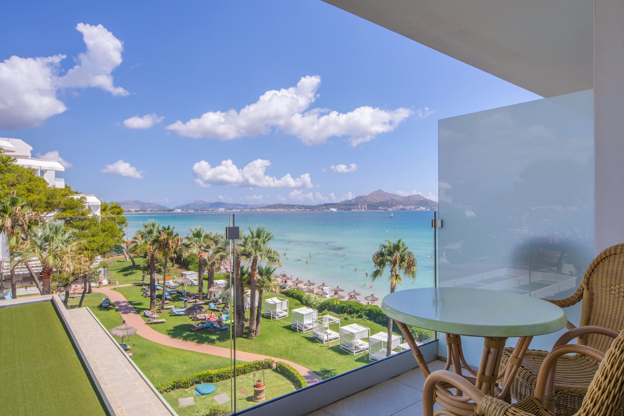 a view of a beach from a balcony