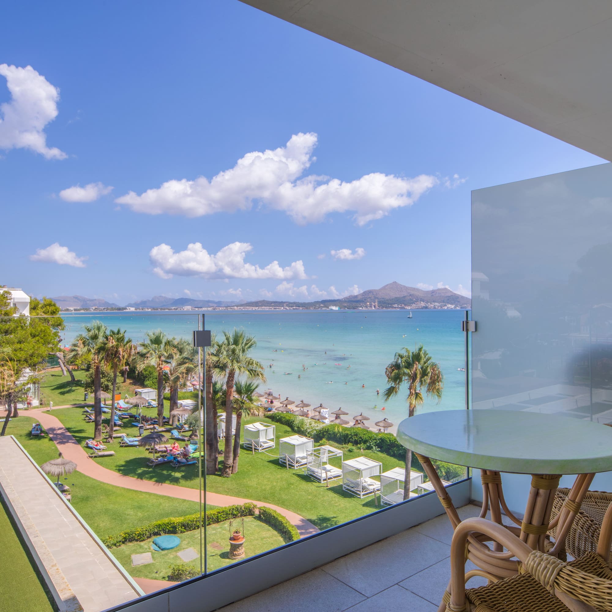 a view of a beach from a balcony