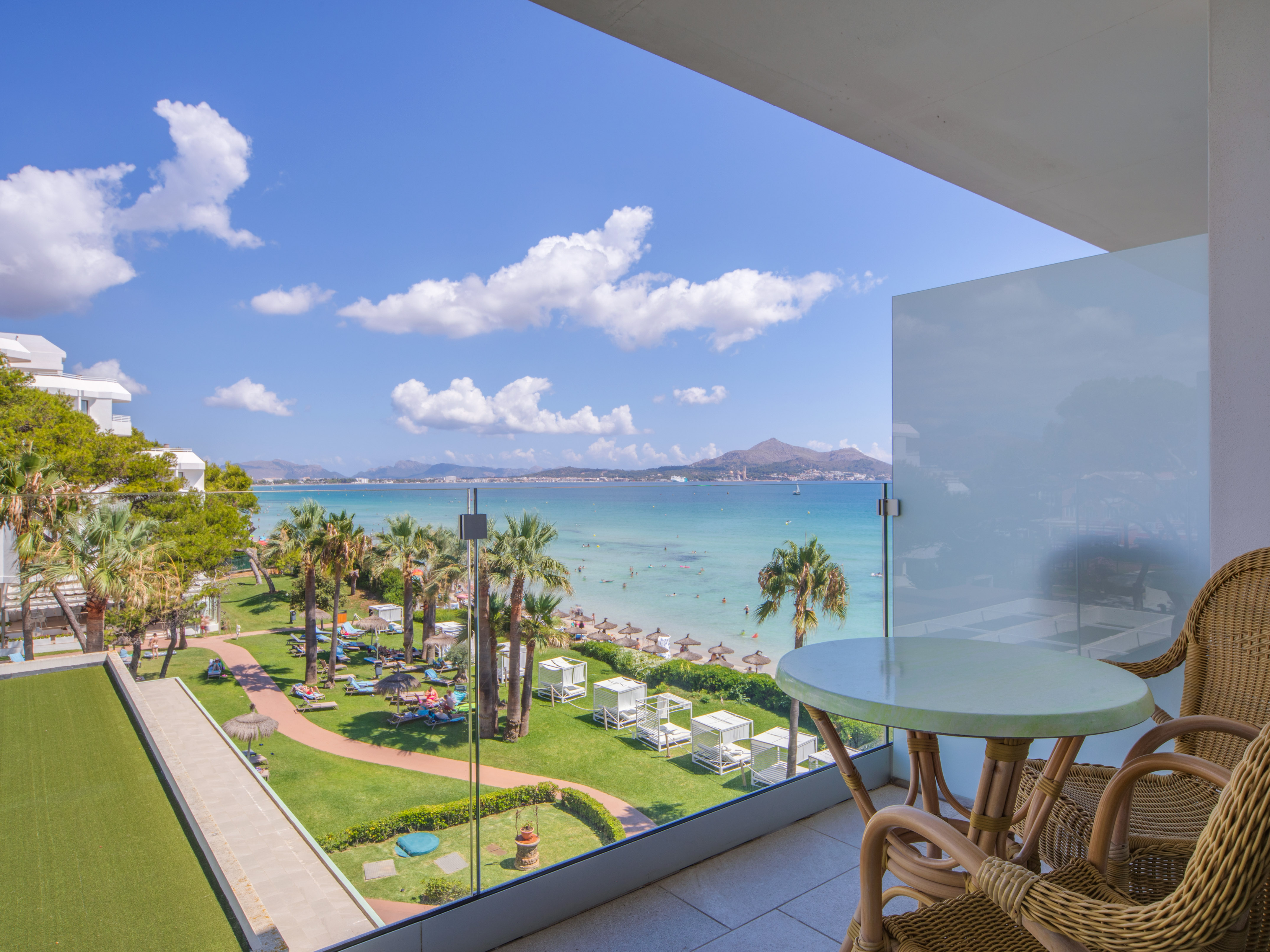 a view of a beach from a balcony