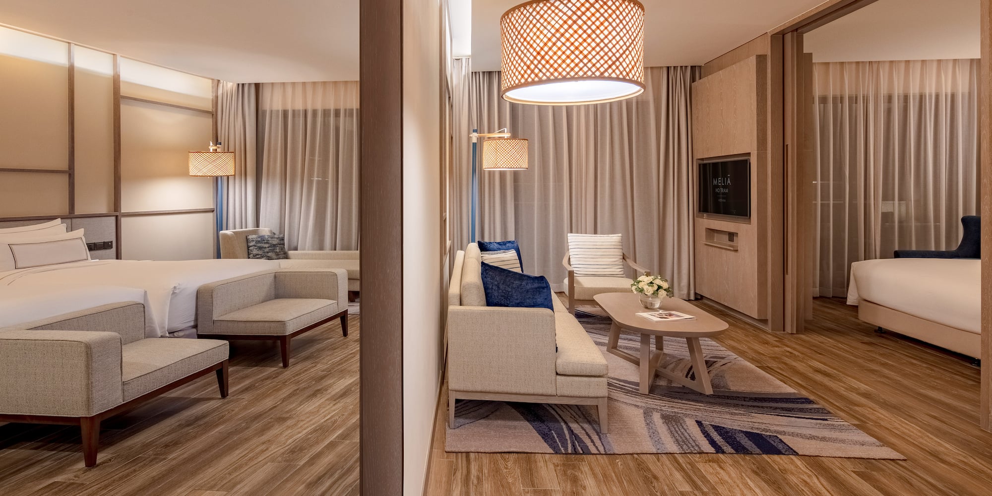 a room with a bed and couches