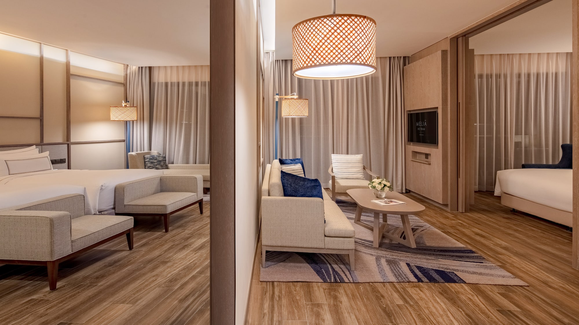 a room with a bed and couches