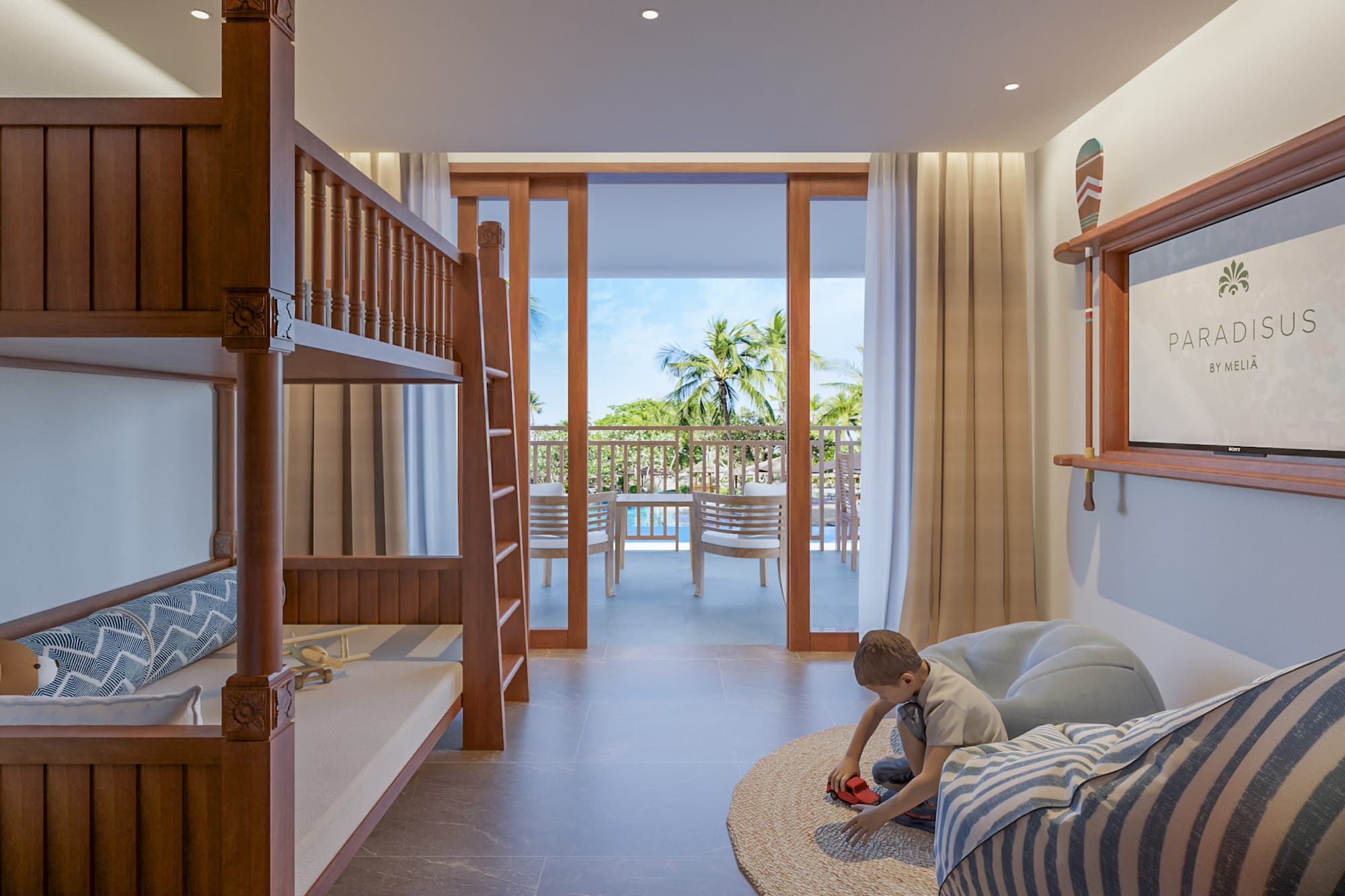 a boy playing in a room with bunk beds