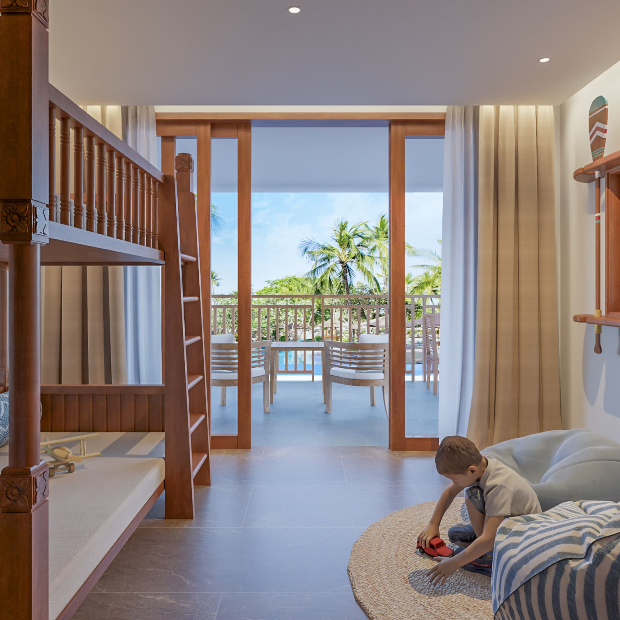 a boy playing in a room with bunk beds
