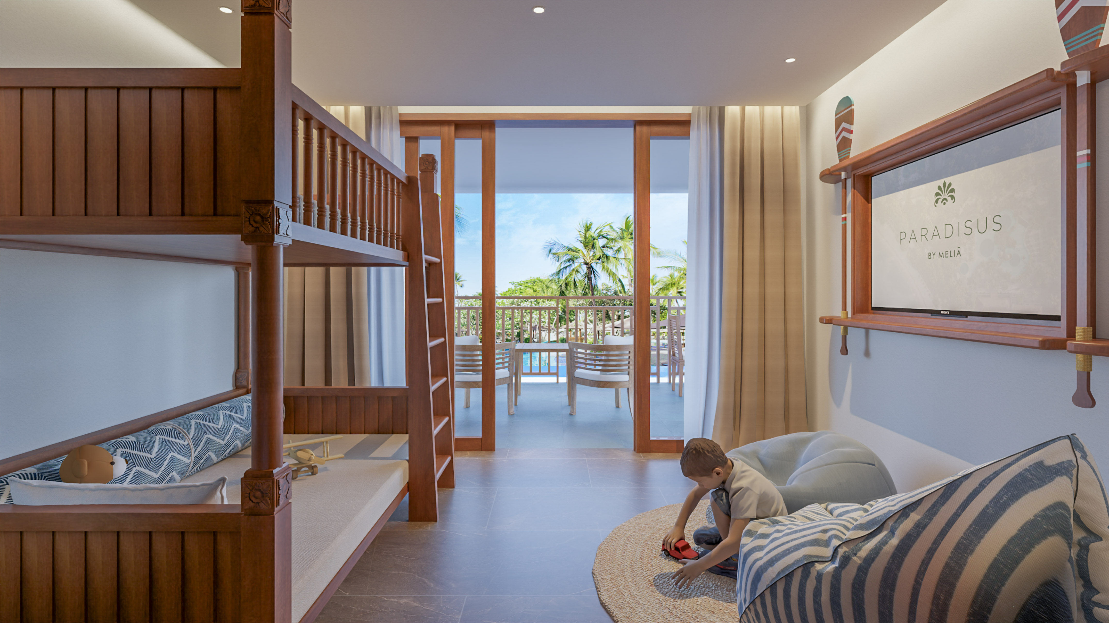 a boy playing in a room with bunk beds