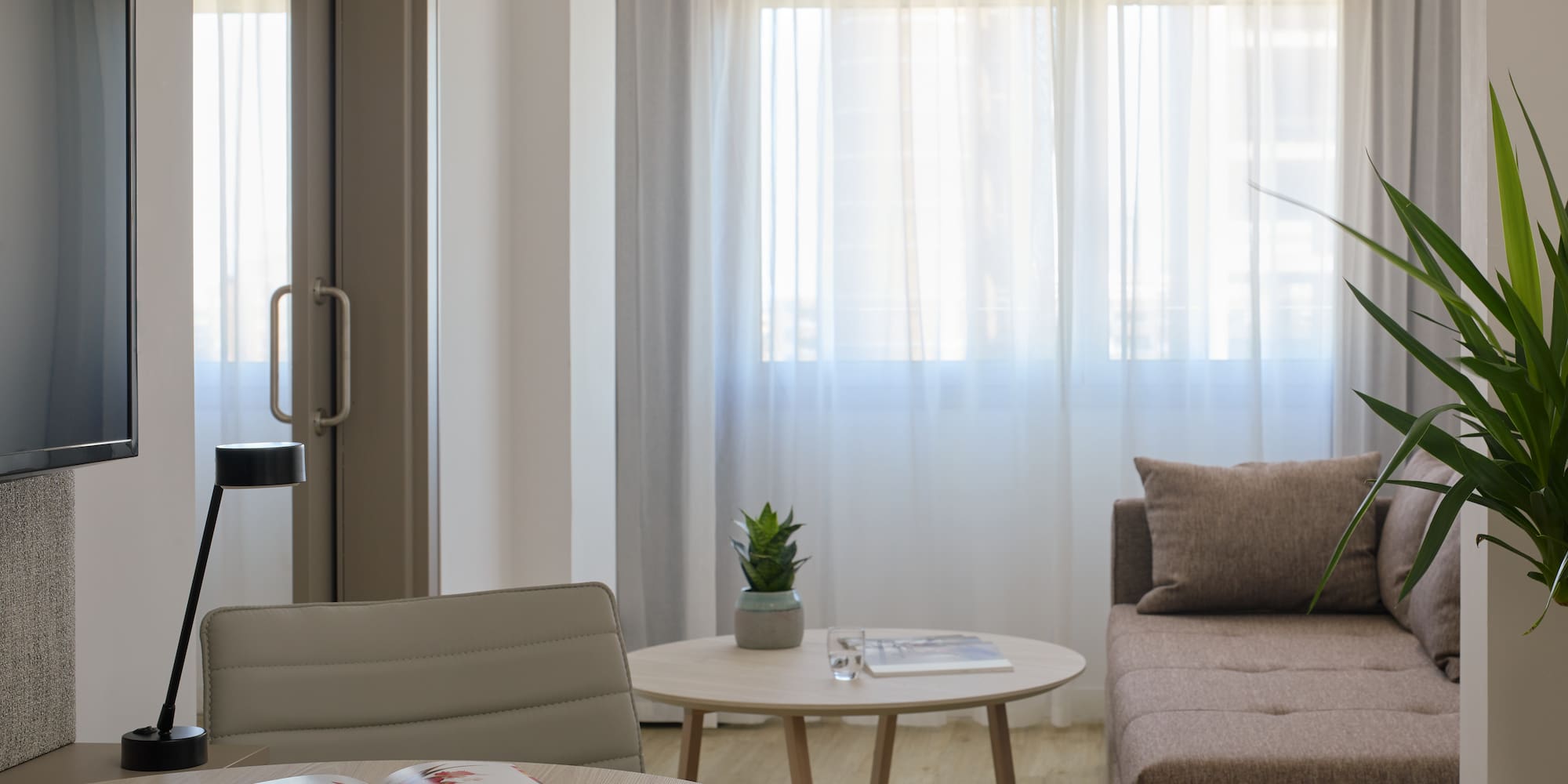 a living room with a couch and a coffee table